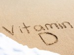 Vitamin D written in the sand
