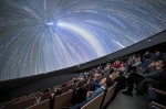 ESON members watch a show at the ESO Supernova